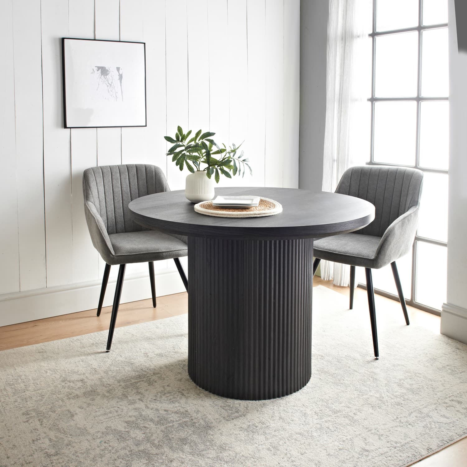 425885-ezra-black-dining-table-with-panelled-base-105cm.jpg Ezra Dining Table with Panelled Base – Black - Image 1